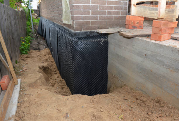 SJ Waterproofing Pros technician performing targeted Waterproofing assessment in Buena, NJ